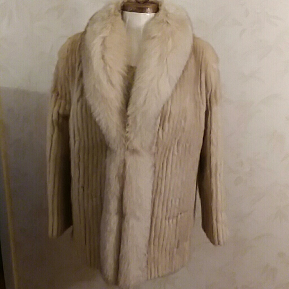 SAGA Mink by Pd Furs white short hair mink jacket.